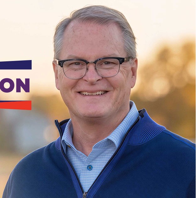 Adam Hamilton speaking outdoors in Kansas